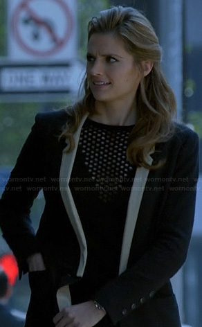 Beckett’s black blazer with white lapel and triangle mesh inset top on Castle