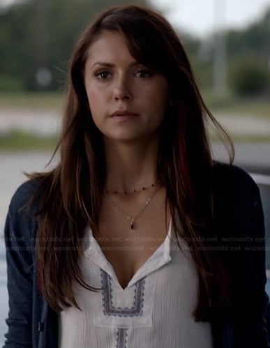 Elena’s white split neck top on The Vampire Diaries