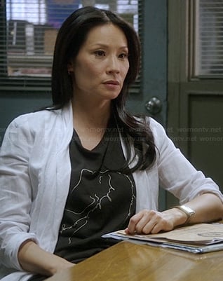 Joan’s black line-graphic tee on Elementary