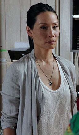 Joan’s white snake print tank top on Elementary