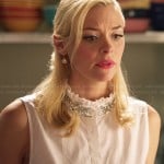 Lemon’s white sleeveless top with ruffled embellished neckline on Hart of Dixie