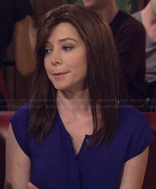 Lily’s blue short sleeved button front top on How I Met Your Mother