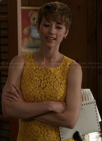Margaux’s yellow lace dress and studded clutch on Revenge