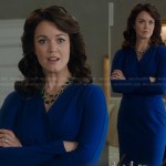 Mellie’s blue long sleeved wrap dress on Scandal
