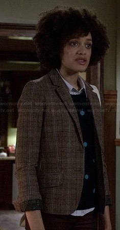 Remy’s blue polka dot sweater and check print blazer on Ravenswood