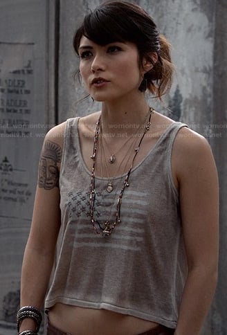 Sophie’s flag print crop top on The Originals