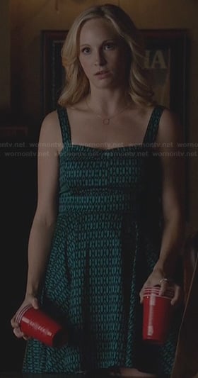 Caroline’s blue and green patterned party dress and square necklace on The Vampire Diaries