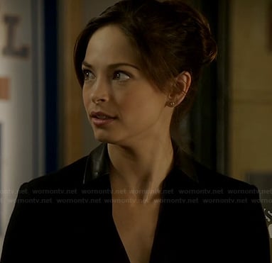 Cat’s black blazer with leather collar on Beauty and the Beast