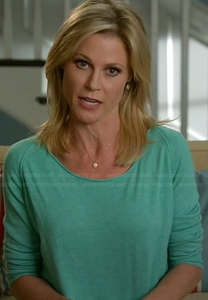 Claire’s aqua green sweatshirt on Modern Family