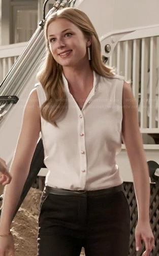 Emily’s white top with gold buttons and leather trimmed pants on Revenge