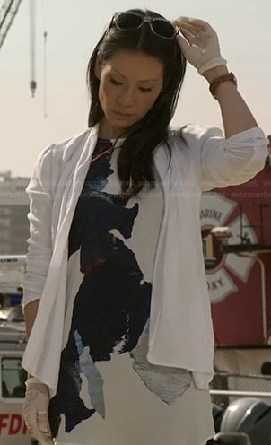 Joan’s white abstract printed top on Elementary
