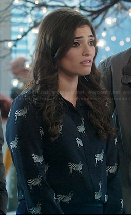 Lauren’s zebra print top on The Crazy Ones