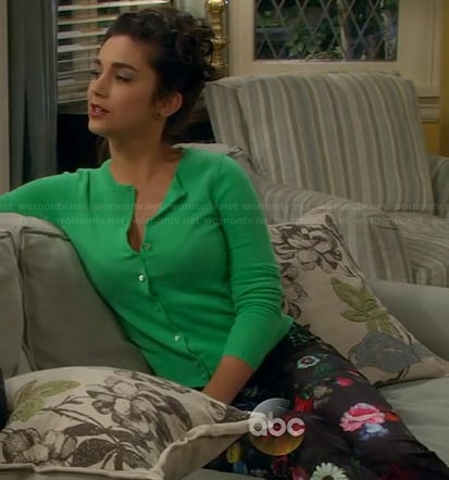 Mandy’s green cardigan and floral jeans on Last Man Standing