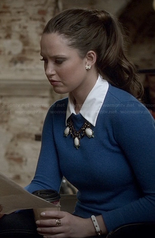 Olivia’s blue sweater with elbow patches on Ravenswood