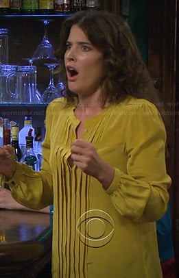 Robin’s yellow pleated blouse on How I Met Your Mother