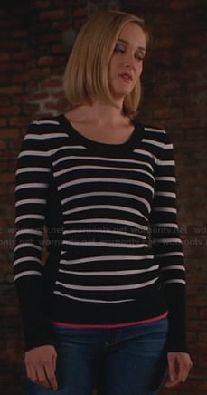 Robin’s striped sweater with pink trim on The Good Wife
