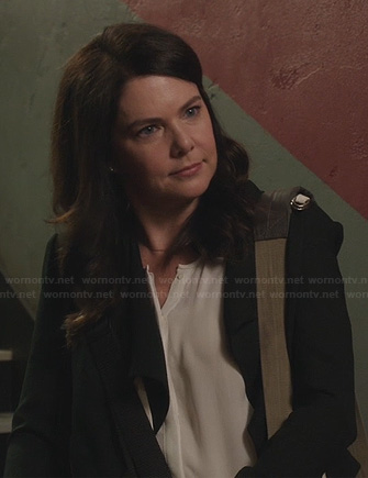 Sarah’s white blouse and black jacket on Parenthood