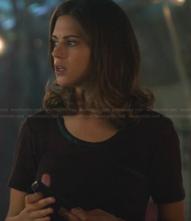 Alex’s burgundy tee with leather trim on Nikita
