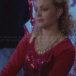 Carrie’s red sequin front sweater and white necklace on The Carrie Diaries