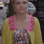 Carrie’s shoe print dress and yellow and pink embellished cardigan on The Carrie Diaries