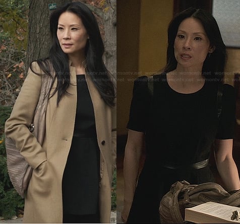Joan’s black leather trimmed dress and long tan coat on Elementary