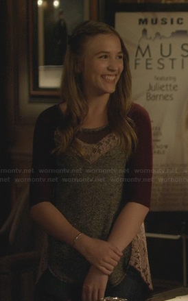Maddie’s grey top with red sleeves and pink lace panels on Nashville