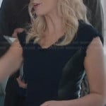 Sydney’s navy blue tweed peplum top with leather panels on The Crazy Ones