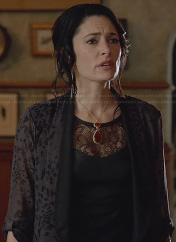 Wendy’s black leather top with lace inset on Witches of East End
