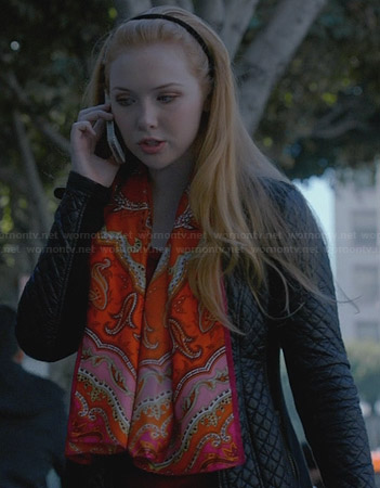 Alexis’s black quilted coat and orange paisley scarf on Castle