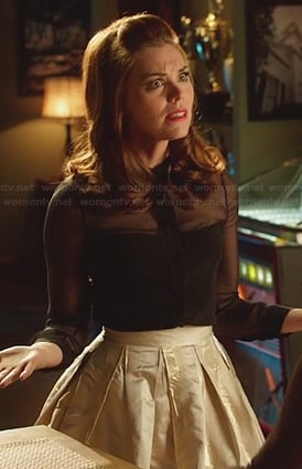 AnnaBeth’s black mesh blouse and champagne pleated skirt on Hart of Dixie