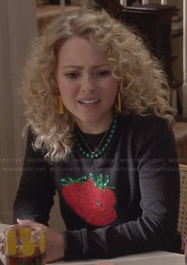 Carrie’s black strawberry sweater on The Carrie Diaries