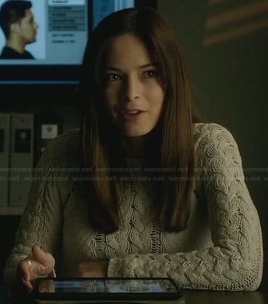 Cat’s white studded cable knit sweater on Beauty and the Beast