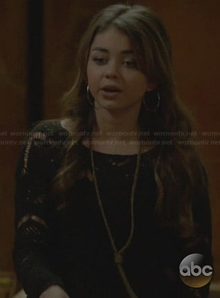 Haley’s black crochet sweater on Modern Family