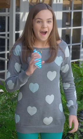 Hillary’s grey heart sweater on Trophy Wife