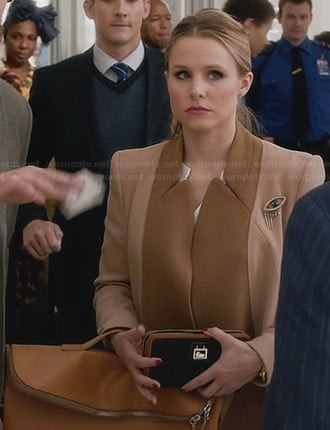 Jeannie’s two-tone coat and foldover bag on House of Lies