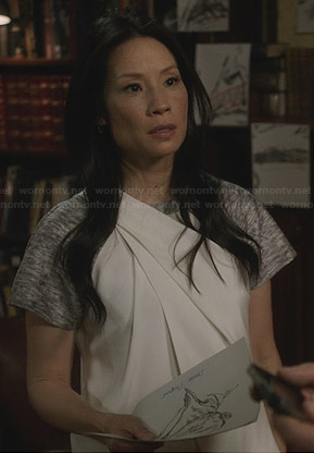 Joan’s grey and white asymmetric wrap dress on Elementary