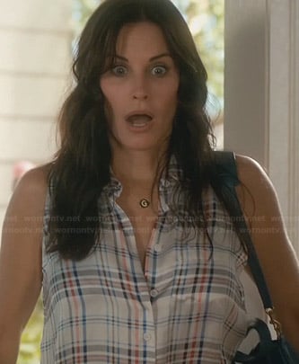 Jules’s white sleeveless plaid button front shirt on Cougar Town