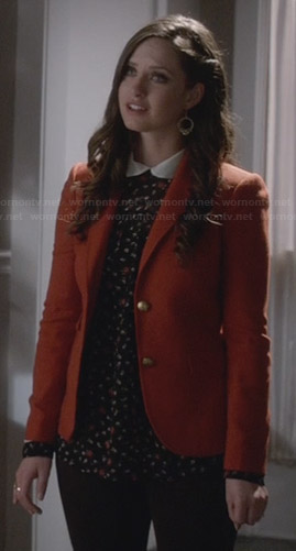 Olivia’s rust orange blazer and floral collared blouse on Ravenswood