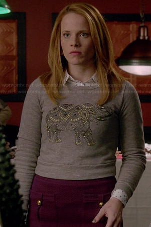 Daphne’s grey elephant sweater and purple pocket front skirt on Switched at Birth