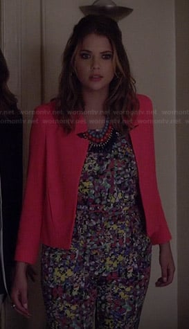 Hanna’s multi-colored jumpsuit and neon pink jacket on Pretty Little Liars