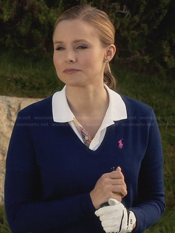 Jeannie’s navy blue v-neck golf sweater on House of Lies