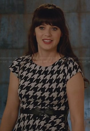 Jess’s houndstooth dress and black bow belt on New Girl