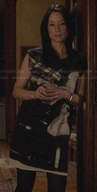 Joan’s black and white graphic printed shift dress on Elementary
