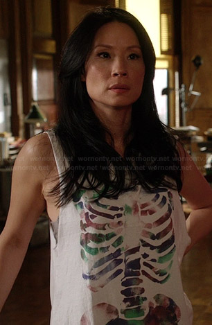 Joan’s white skeleton graphic tank top on Elementary