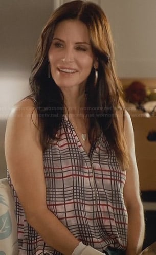 Jules’s plaid zip front top on Cougar Town