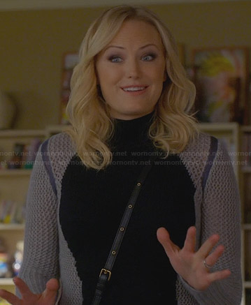 Kate’s black sweater with grey knit sleeves on Trophy Wife