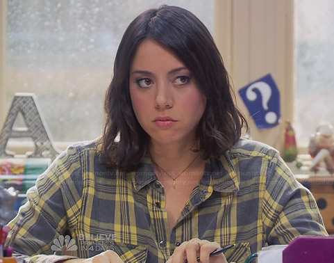 April’s yellow and grey plaid shirt on Parks and Recreation