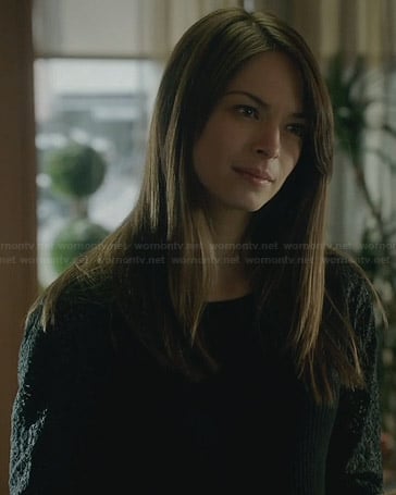 Cat’s black sweater with lace sleeves on Beauty and the Beast