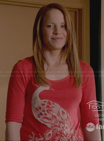 Daphne’s coral pink peacock top on Switched at Birth