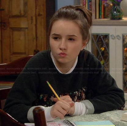 Eve’s grey sweater with front floral panel on Last Man Standing
